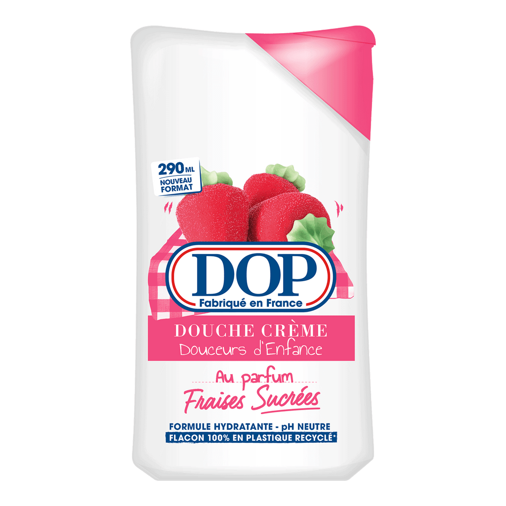 Front view of a white bottle of DOP Douche Crème Douceurs d’Enfance, featuring images of sugared strawberries. The label highlights a sweet strawberry fragrance, 290 ml format, hydrating formula, pH neutral, and a bottle made from 100% recycled plastic.