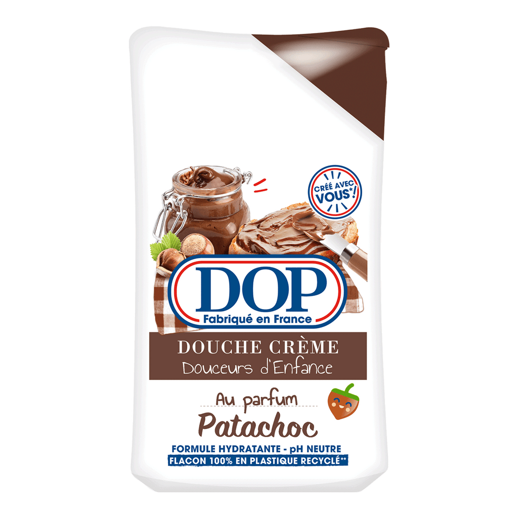Front view of a white bottle of DOP Douche Crème Douceurs d’Enfance au parfum Patachoc, featuring an image of chocolate spread on bread with hazelnuts. The label highlights its hydrating formula, pH neutral, 100% recycled plastic bottle, and its chocolate-hazelnut scent.