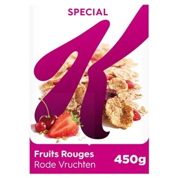 A 450g box of K-Special Fruits Rouges (Rode Vruchten) cereal. The packaging features a large magenta 'K' logo on a white background, with illustrations of strawberries, cherries, and cereal pieces.