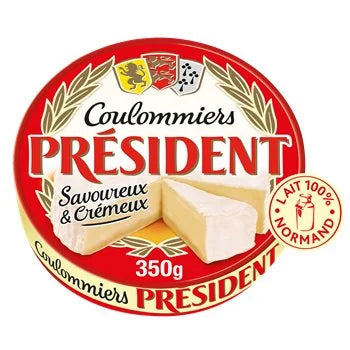 A round package of Coulommiers President soft cheese, featuring a red and white label with the brand name in large red letters, a slice of pale cheese illustration, and a small 'Lait 100% Normand' badge on a white background.