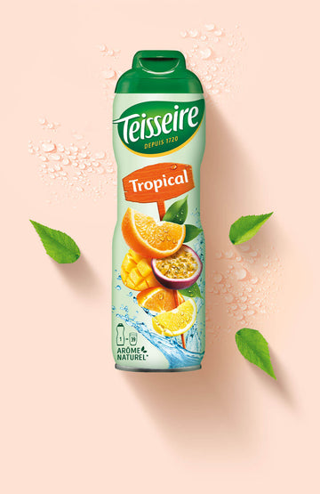 Teisseire Dépissée Tropical air freshener bottle with a green cap, featuring tropical fruit illustrations, set against a light peach background with decorative leaves and water droplets.