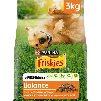 A bag of Friskies Vitafit Chicken & Vegetable Croquettes with a picture of a dog playing on grass.
